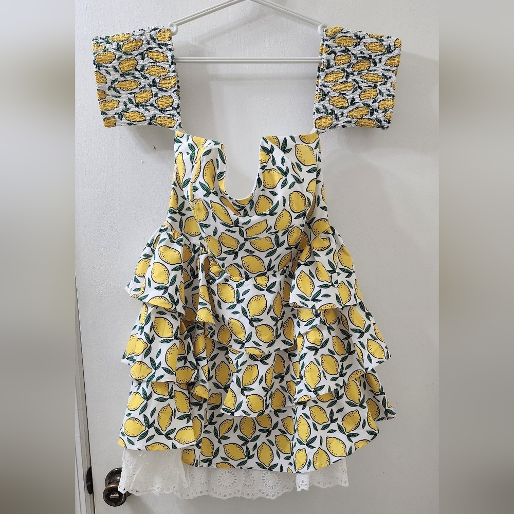 By Egreis ruffled top, size large, lemon print.
